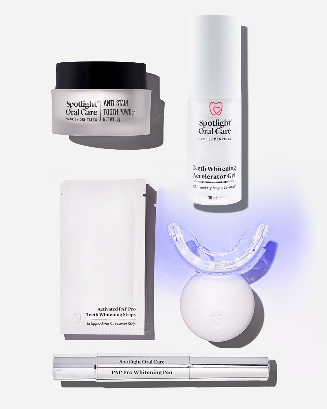 Spotlight Oral Care Bright and White Bundle featuring Professional LED Teeth Whitening System, Anti-Stain Tooth Powder, Teeth Whitening Pen, Whitening Strips, and Accelerator Gel