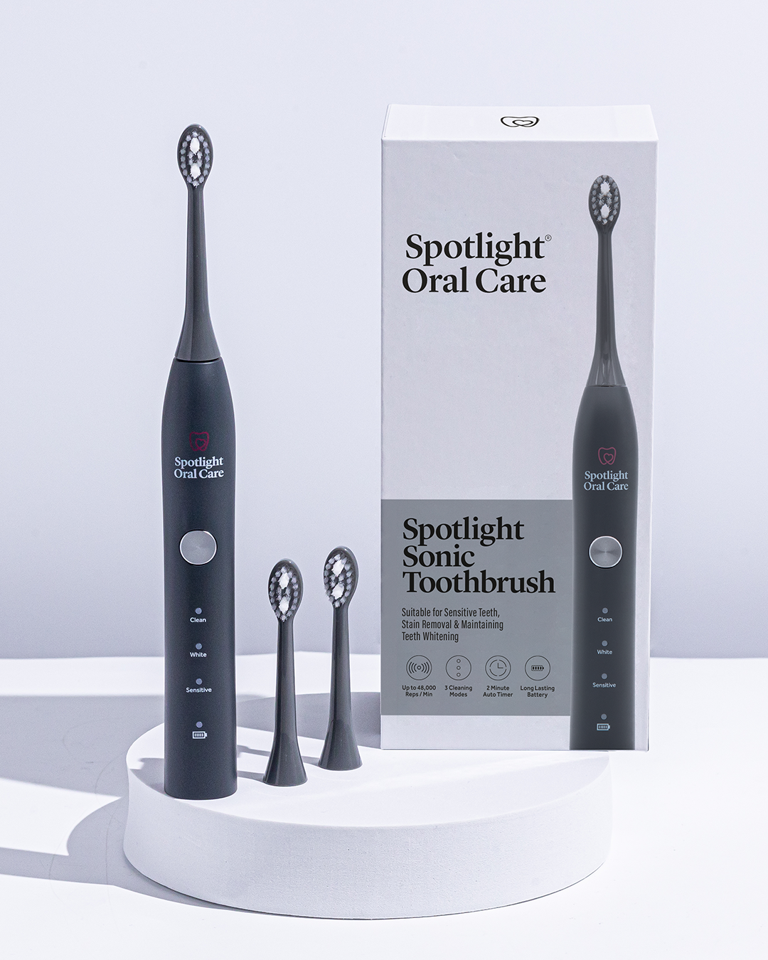 Sleek and stylish Graphite Grey Sonic Toothbrush offering a professional-level clean with included charger and nine months of replacement heads