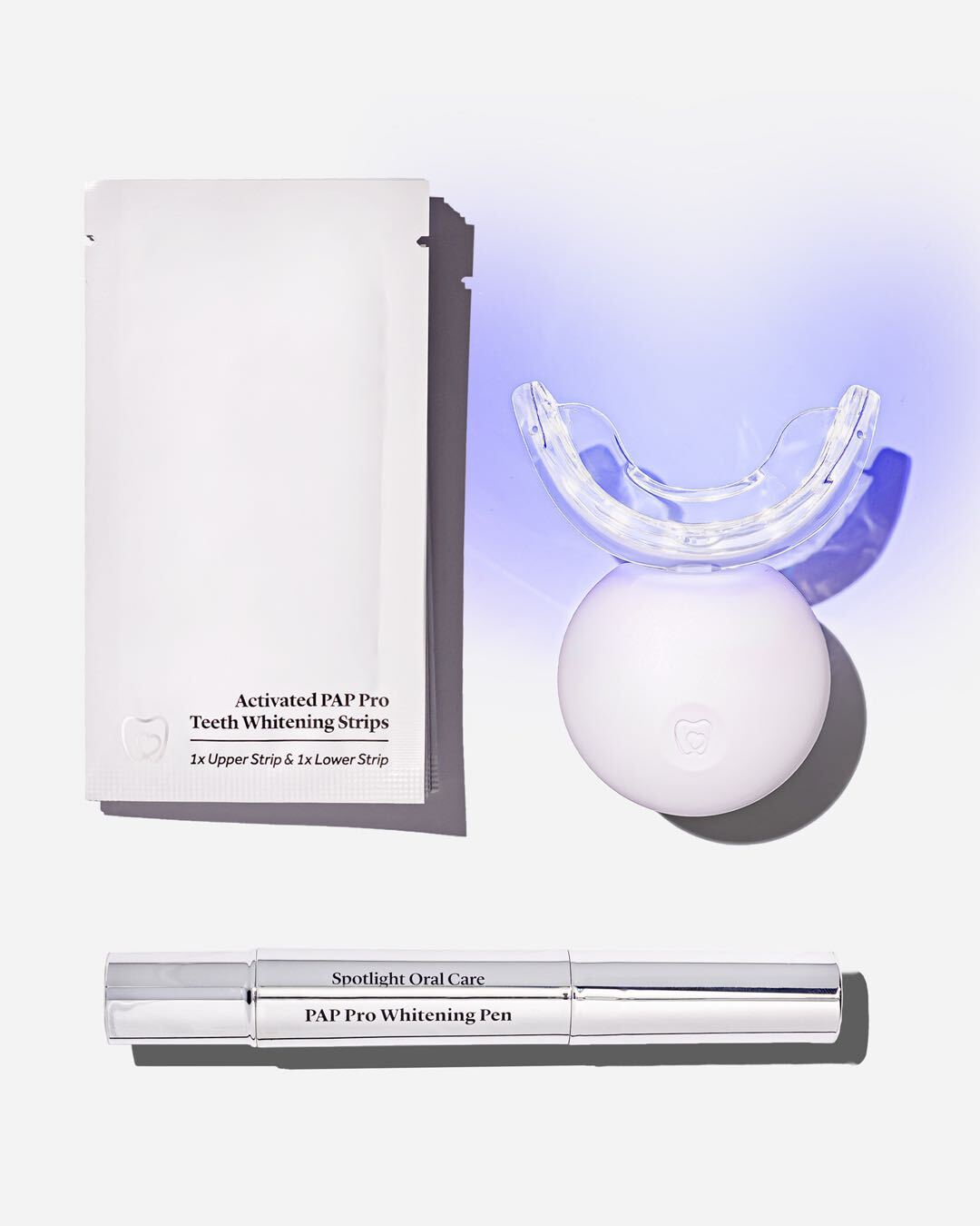 Spotlight Oral Care Professional LED Teeth Whitening System featuring dual-action red and blue light technology to break down stains and rejuvenate gums