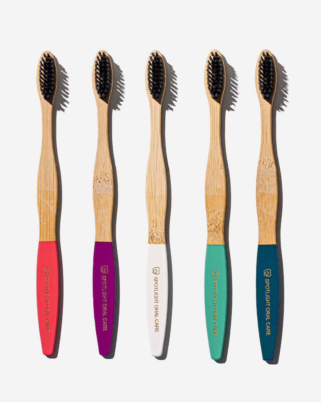 Set of five eco-friendly bamboo toothbrushes featuring soft bristles for gentle and effective cleaning, ideal for sustainable daily oral care routines