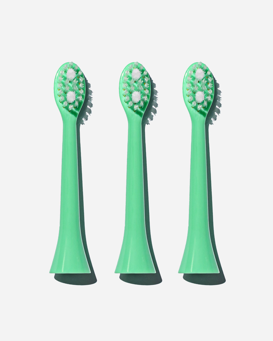 Spotlight Oral Care Sonic Toothbrush Replacement Heads in Coral Green, designed exclusively for the Sonic Toothbrush to ensure optimal cleaning performance