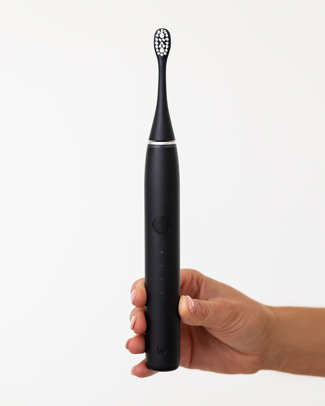 Dentist-developed Sonic Pro Toothbrush in Jet Black designed to remove stains, and promote oral health for a brighter and healthier smile at home
