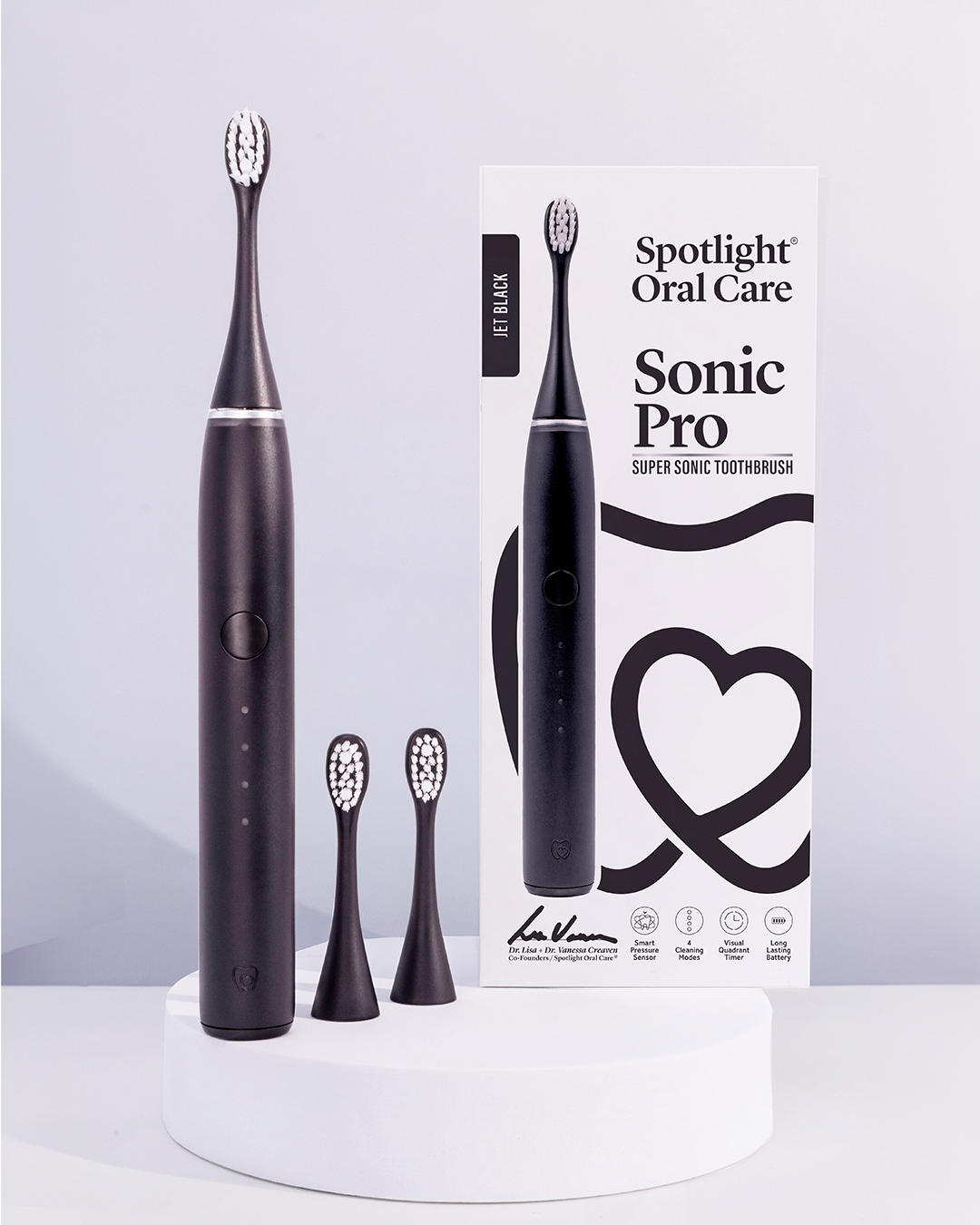 Jet Black Sonic Pro Toothbrush equipped with a visual quadrant timer and micro point tongue cleaner for comprehensive oral hygiene ​