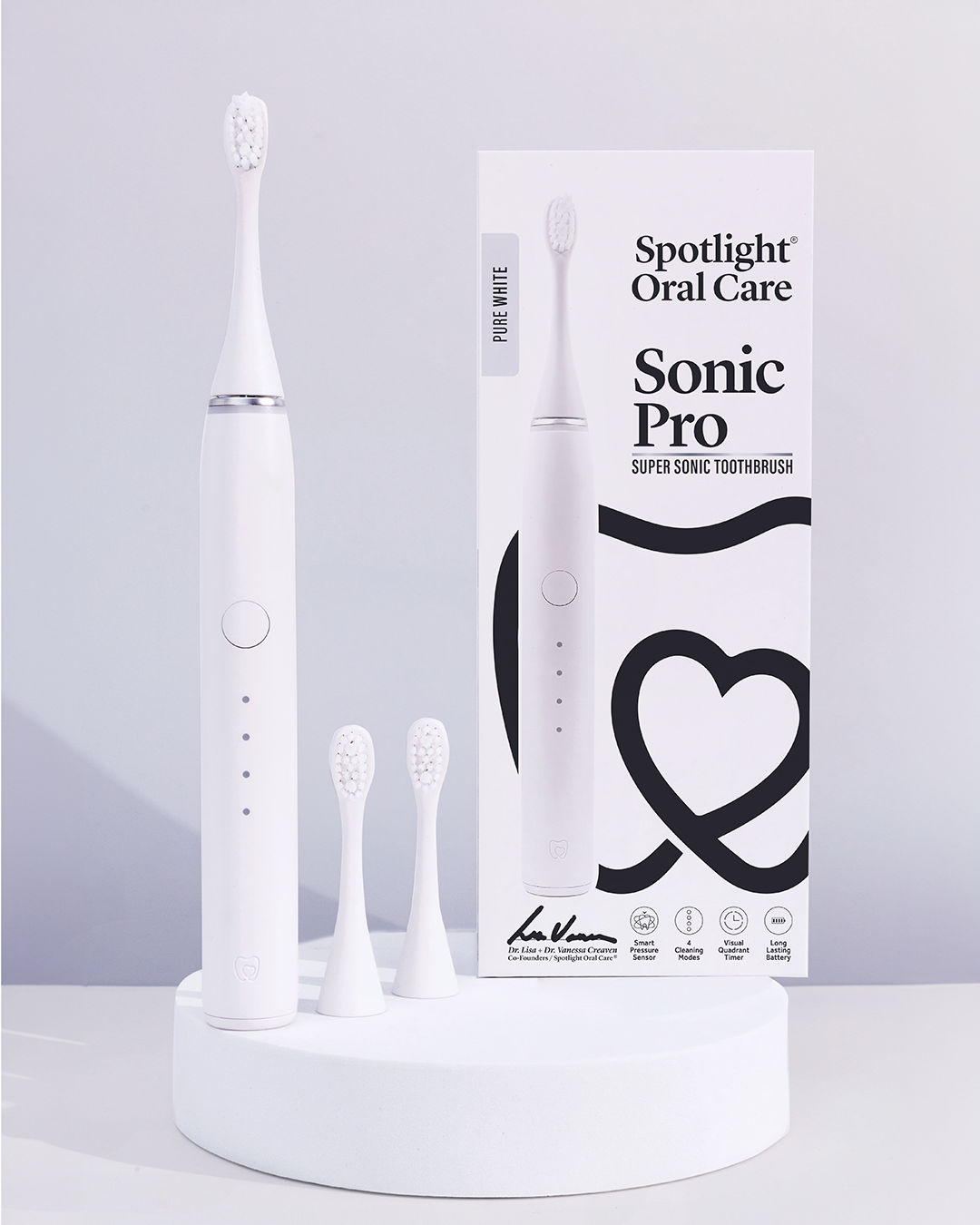 Pure White Sonic Pro Toothbrush equipped with a visual quadrant timer and micro point tongue cleaner for comprehensive oral hygiene​