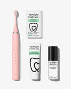 Spotlight Oral Care Sonic Pro Starter Bundle in Blush Pink featuring electric toothbrush, whitening strips, accelerator gel, and professional toothpaste