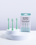 Set of three Coral Green brush heads for the Sonic Toothbrush, featuring soft bristles for effective plaque removal and gum care​
