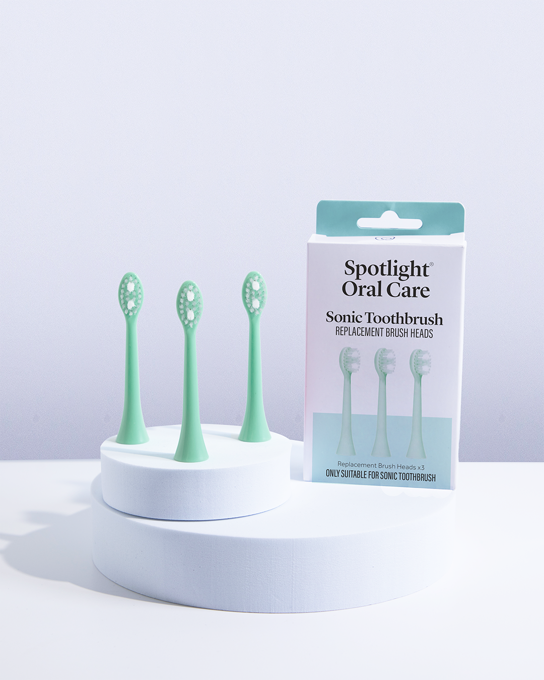 Set of three Coral Green brush heads for the Sonic Toothbrush, featuring soft bristles for effective plaque removal and gum care​