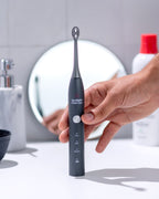 Graphite Grey Sonic Toothbrush equipped with a long-lasting battery life of up to 70 days, making it ideal for travel and daily use​
