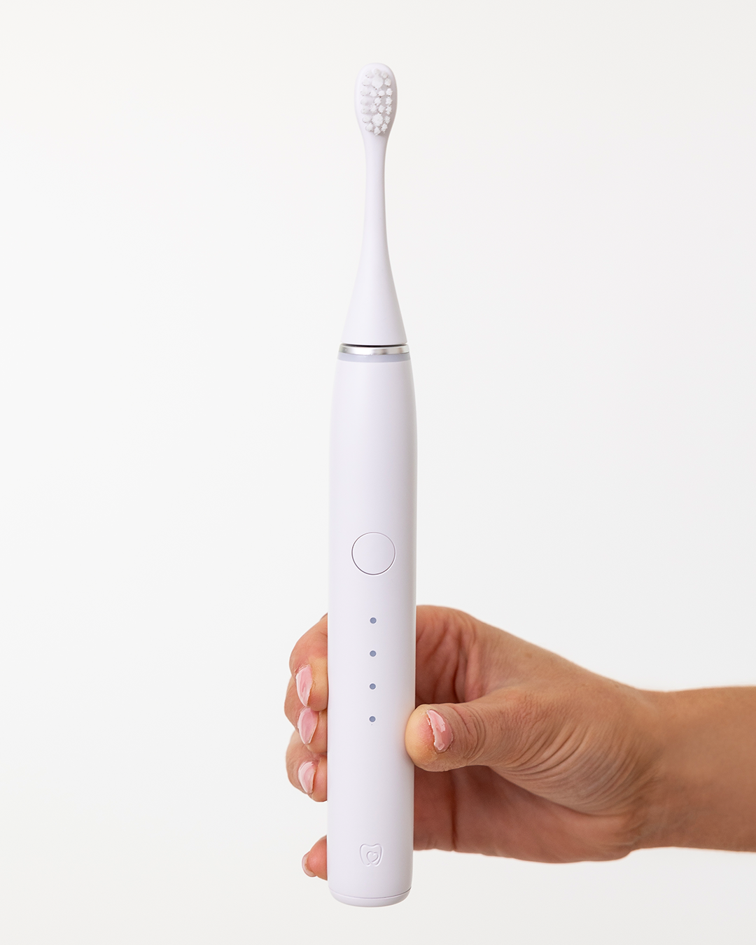 Dentist-developed Sonic Pro Toothbrush in Pure White designed to remove stains, and promote oral health for a brighter and healthier smile at home