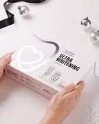 Whitening Starter Kit gift box being opened