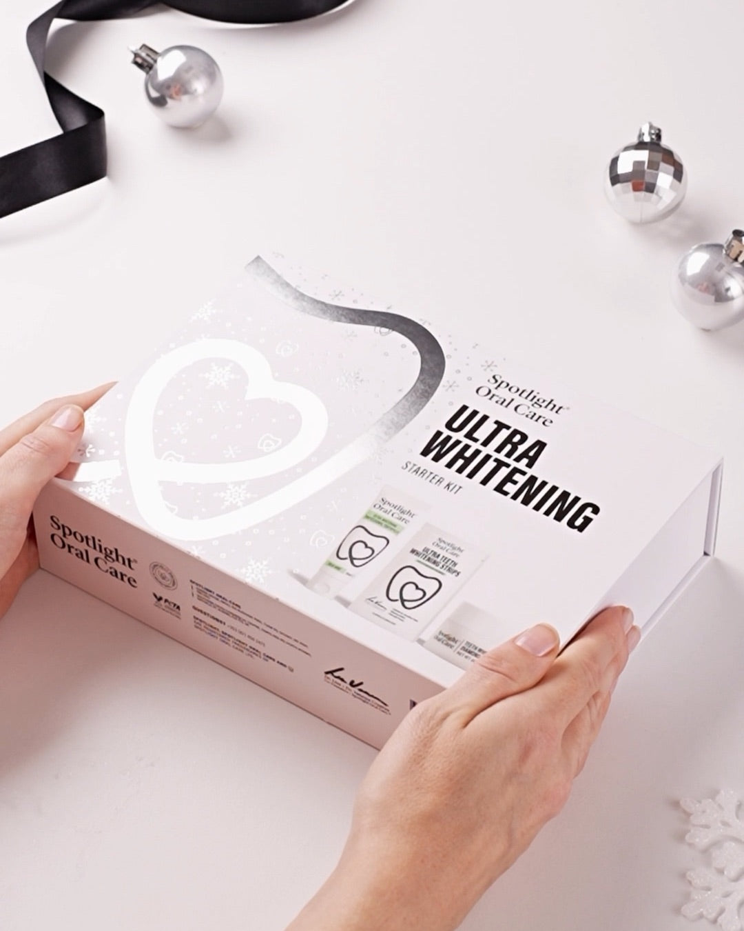 Whitening Starter Kit gift box being opened