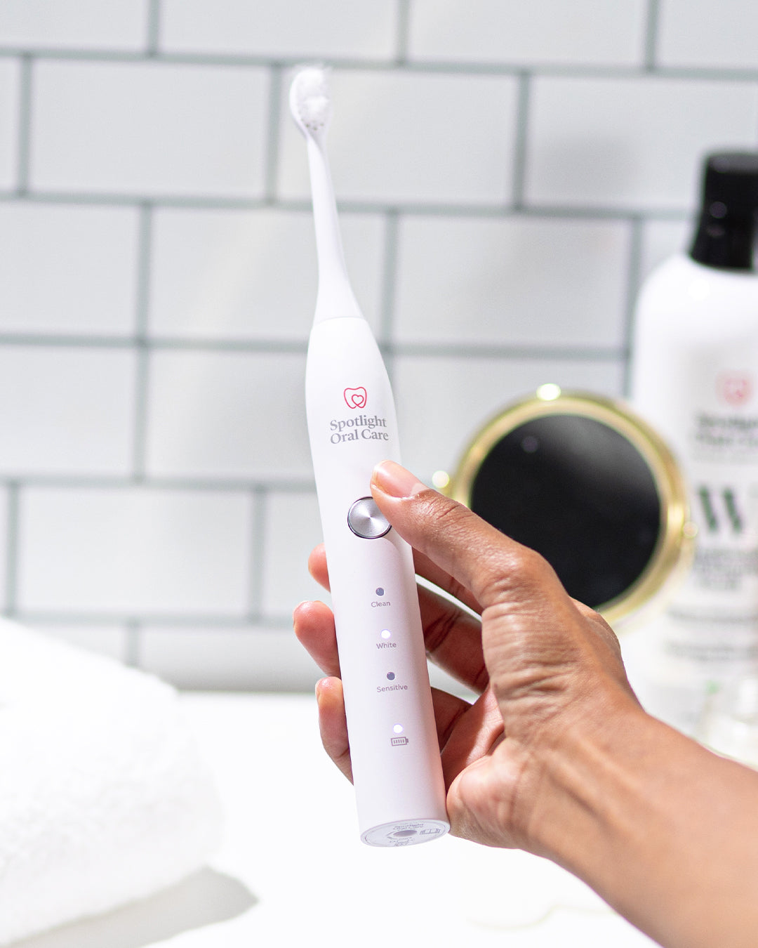 Sleek and stylish Sonic Electric Toothbrush offering a professional-level clean with included charger and nine months of replacement heads​