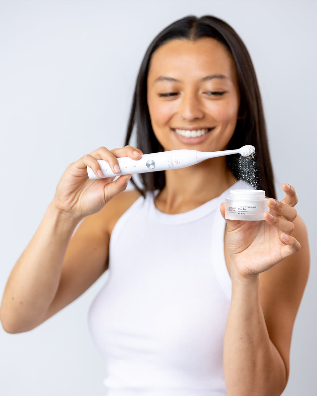 Non-abrasive whitening powder designed to transform any toothpaste into an advanced whitening treatment, suitable for daily use​