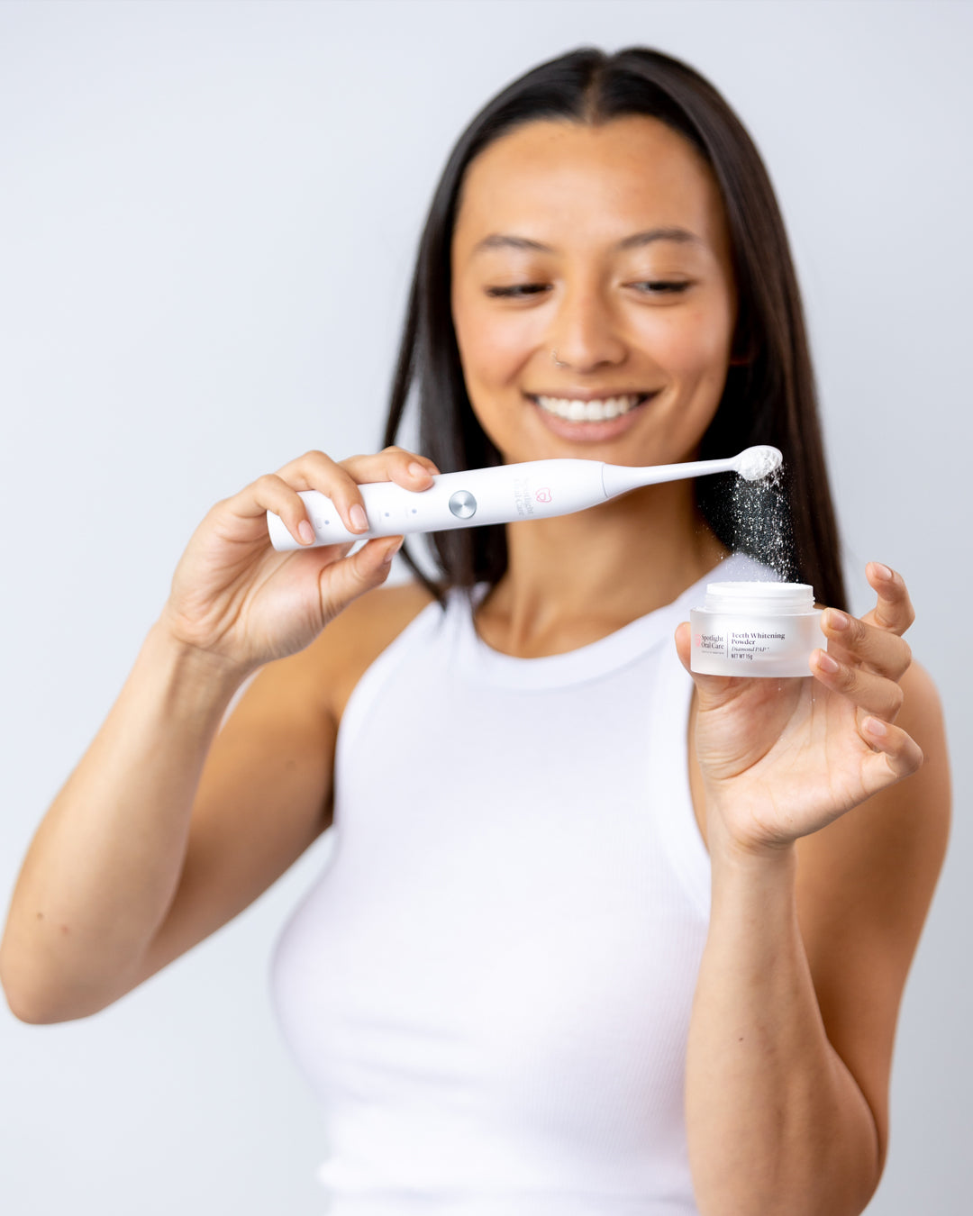 Non-abrasive whitening powder designed to transform any toothpaste into an advanced whitening treatment, suitable for daily use​