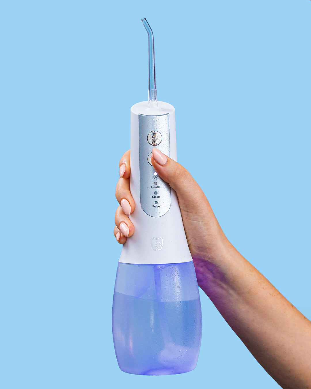 Cordless water flosser equipped with a 400ml refillable tank and Hydro Gravity Ball for a 360° cleaning experience​
