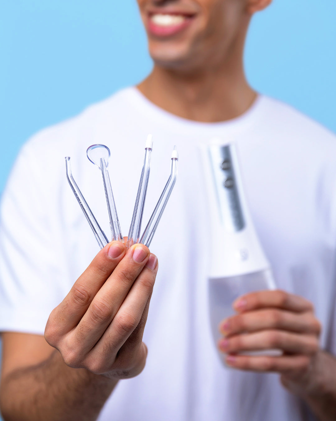 Dentist-developed replacement tips designed to enhance your water flossing experience by targeting plaque, improving gum health, and tackling bad breath​