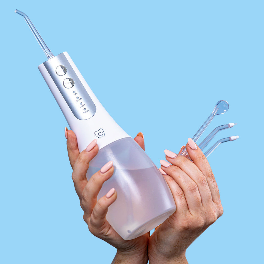 Set of four tips compatible with the Spotlight Water Flosser with UV Steriliser, offering tailored solutions for various dental needs​
