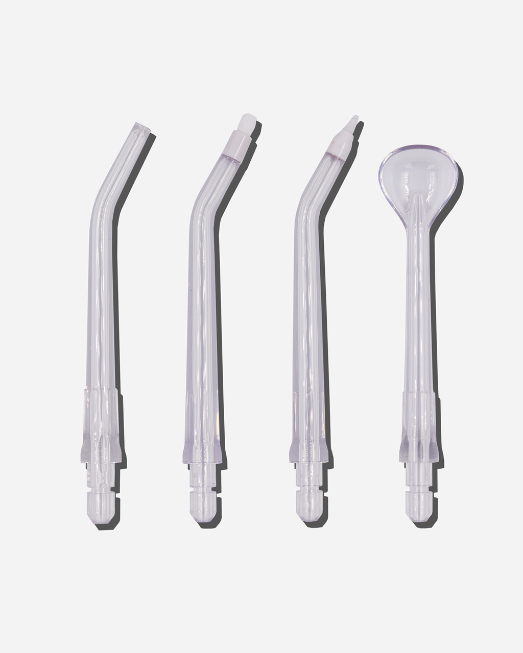 Spotlight Oral Care Water Flosser Replacement Tips set including Classic Jet Tip, Orthodontic Spray Tip, Periodontal Pocket Sprinkler, and Tongue Scraper for comprehensive oral hygiene​